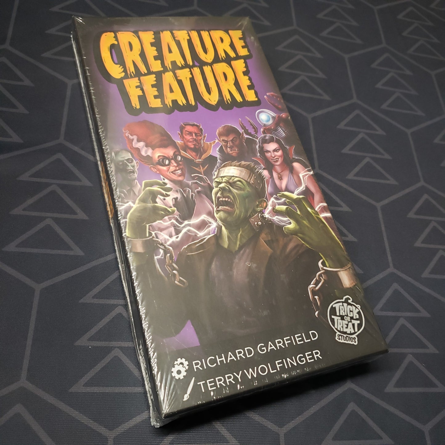 Image shows the front cover of the box for the Creature Feature board game