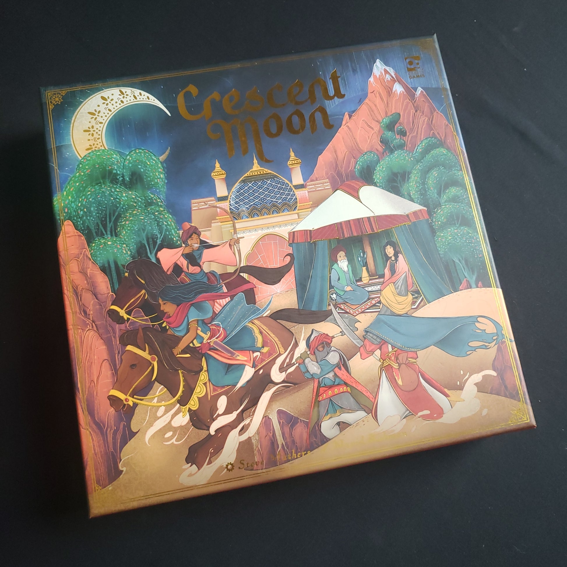 Image shows the front cover of the box of the Crescent Moon board game