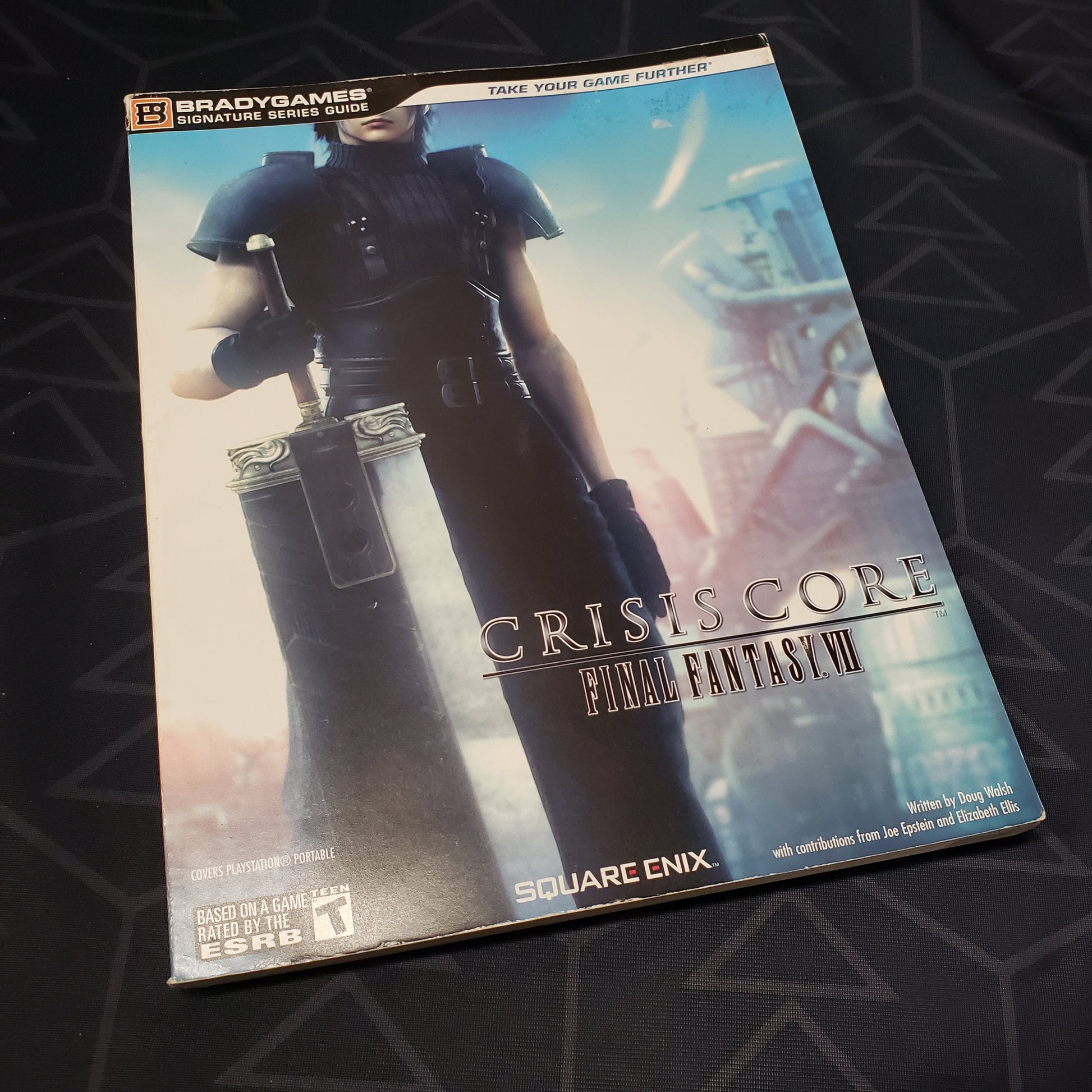 Image shows the front cover of the Crisis Core: Final Fantasy VII strategy guide book