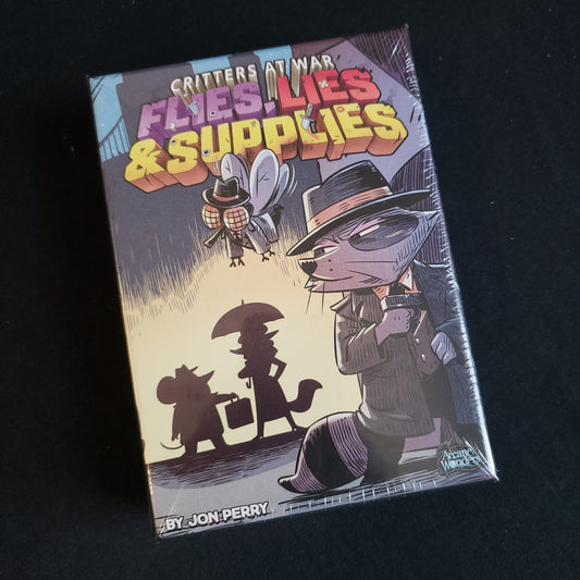 Image shows the front cover of the box of the Critters At War: Flies, Lies & Supplies card game