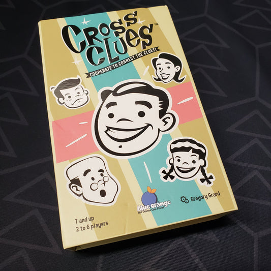 Image shows the front cover of the box for the Cross Clues card game