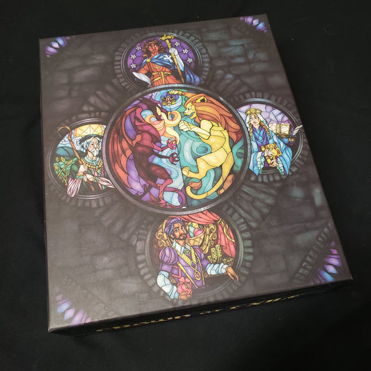 Image shows the front cover of the box of the Crown of Exile board game