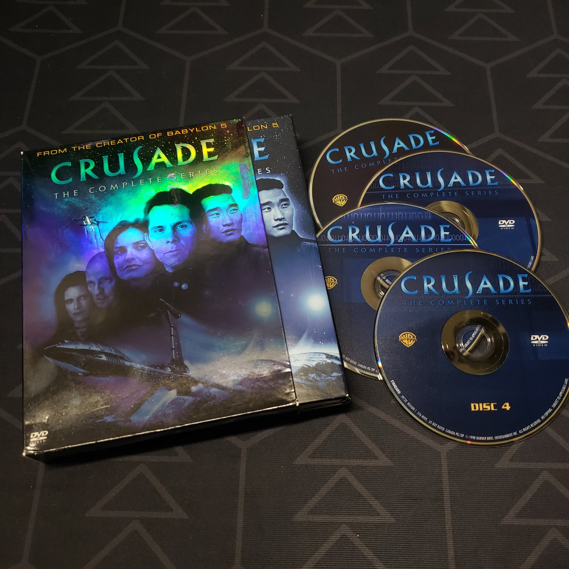 Image shows the outer box, case & four discs for Crusade: The Complete Series on DVD