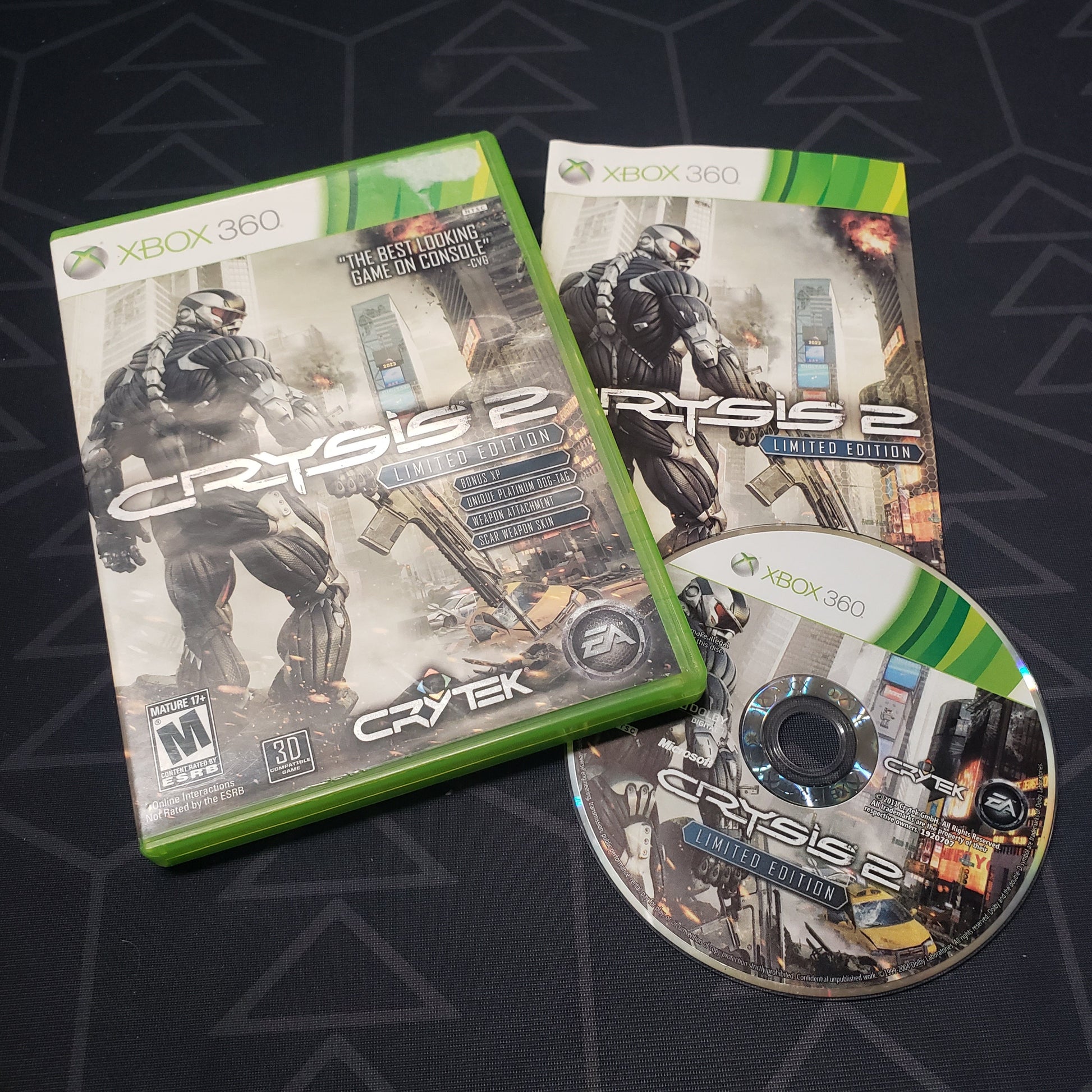 Image shows the case, manual and disc for the video game Crysis 2 for Xbox 360