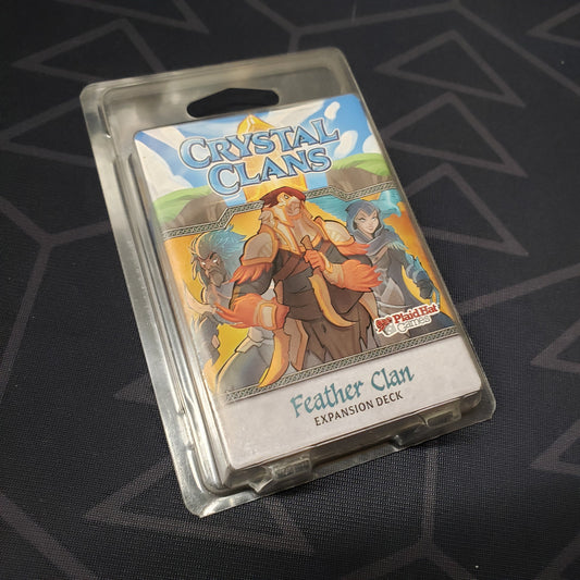 Image shows the front of the package of the Feather Clan expansion for the card game Crystal Clans