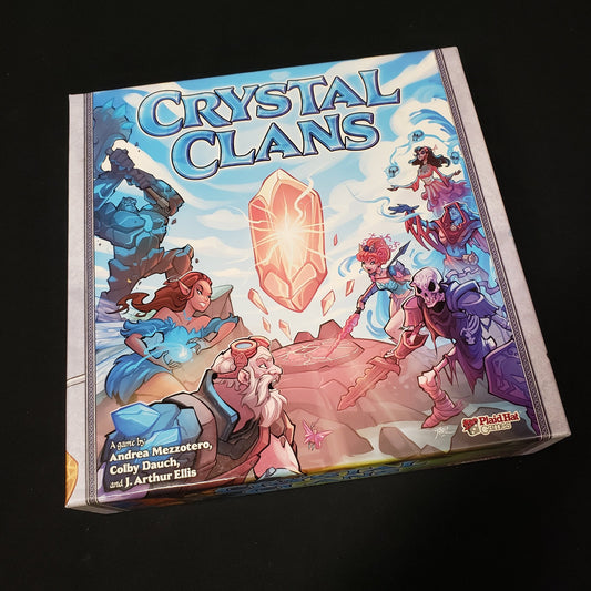 Image shows the front cover of the box of the Crystal Clans card game