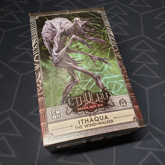 Image shows the front cover of the box of the Ithaqua, the Wind-Walker expansion for the board game Cthulhu: Death May Die