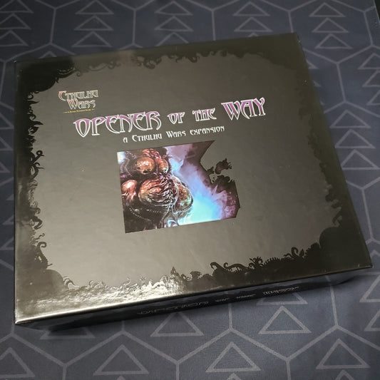 Image shows the front cover of the box of the Opener of the Way expansion for the board game Cthulhu Wars