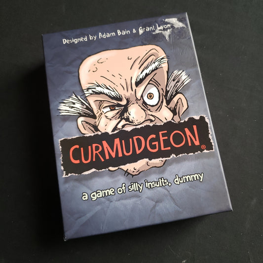 Image shows the front cover of the box of the Curmudgeon card game