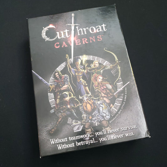 Image shows the front cover of the box of the Cutthroat Caverns board game