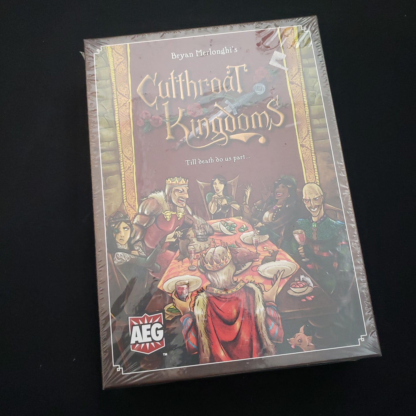 Image shows the front cover of the box of the Cutthroat Kingdoms board game