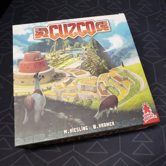 Image shows the front cover of the box for the Cuzco board game