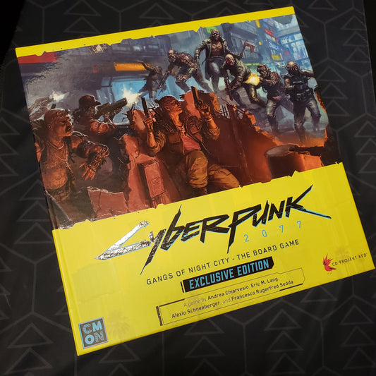 Image shows the front cover of the box for the Exclusive Edition of the board game Cyberpunk 2077: Gangs of Night City