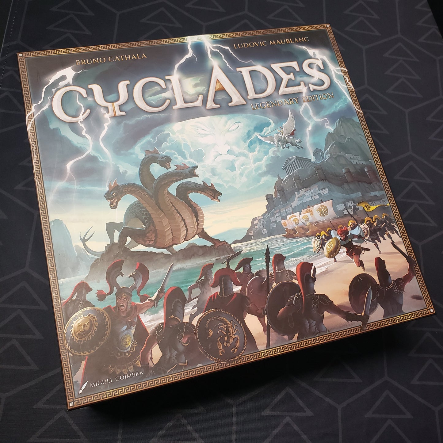 Image shows the front cover of the box for the Cyclades: Legendary Edition board game