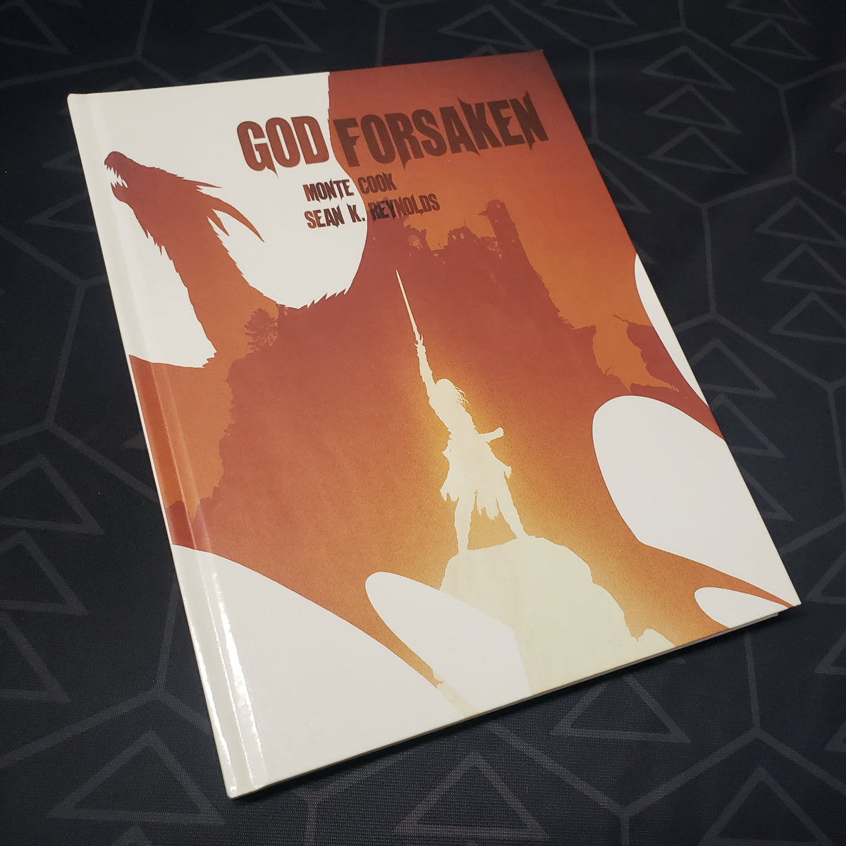 Image shows the front cover of the Godforsaken book for the Cypher System roleplaying game