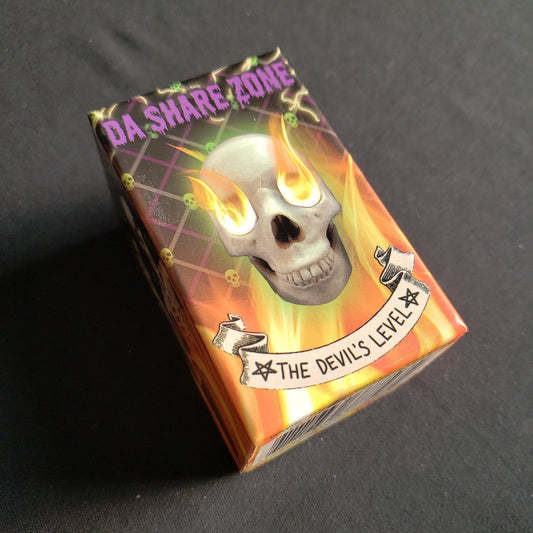 Image shows the front cover of the box of the Devil's Level card game