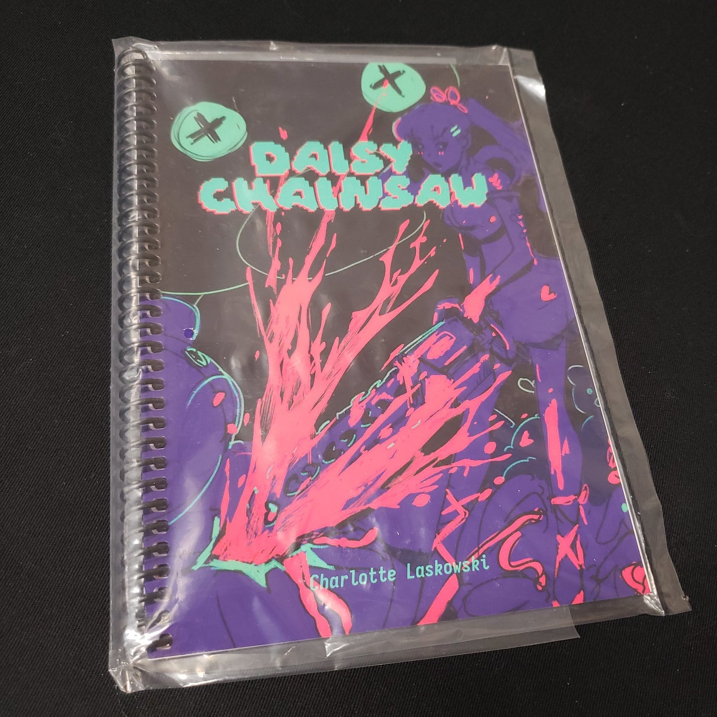 Image shows the front cover of the Daisy Chainsaw roleplaying game book