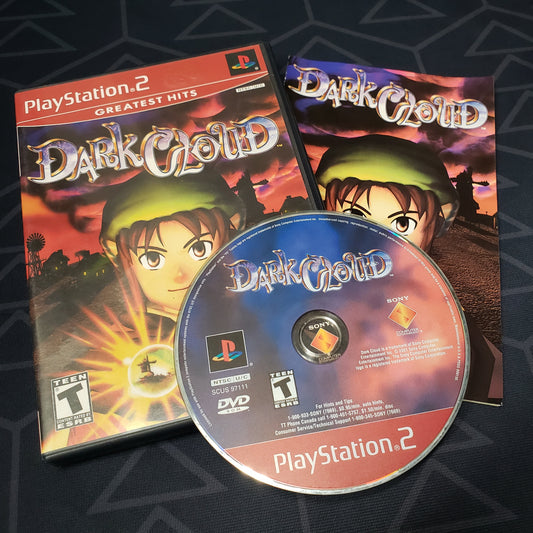 Image shows the case, manual & disc for the video game Dark Cloud for Playstation 2