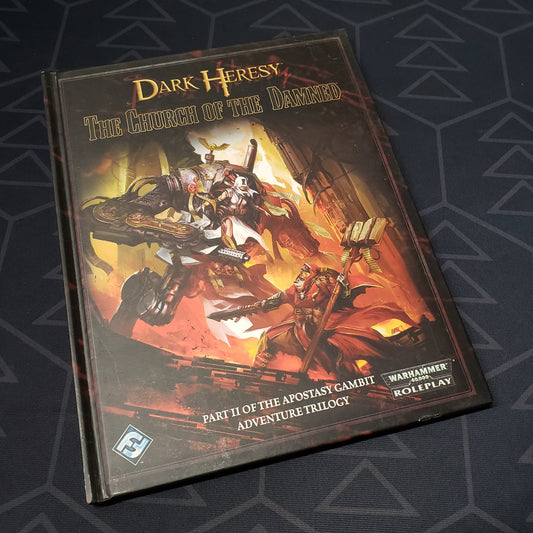 Image shows the front cover of the Church of the Damned book for the roleplaying game Dark Heresy