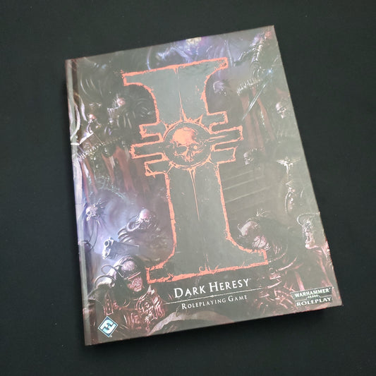 Image shows the front cover of the core rulebook for the Dark Heresy: Second Edition roleplaying game
