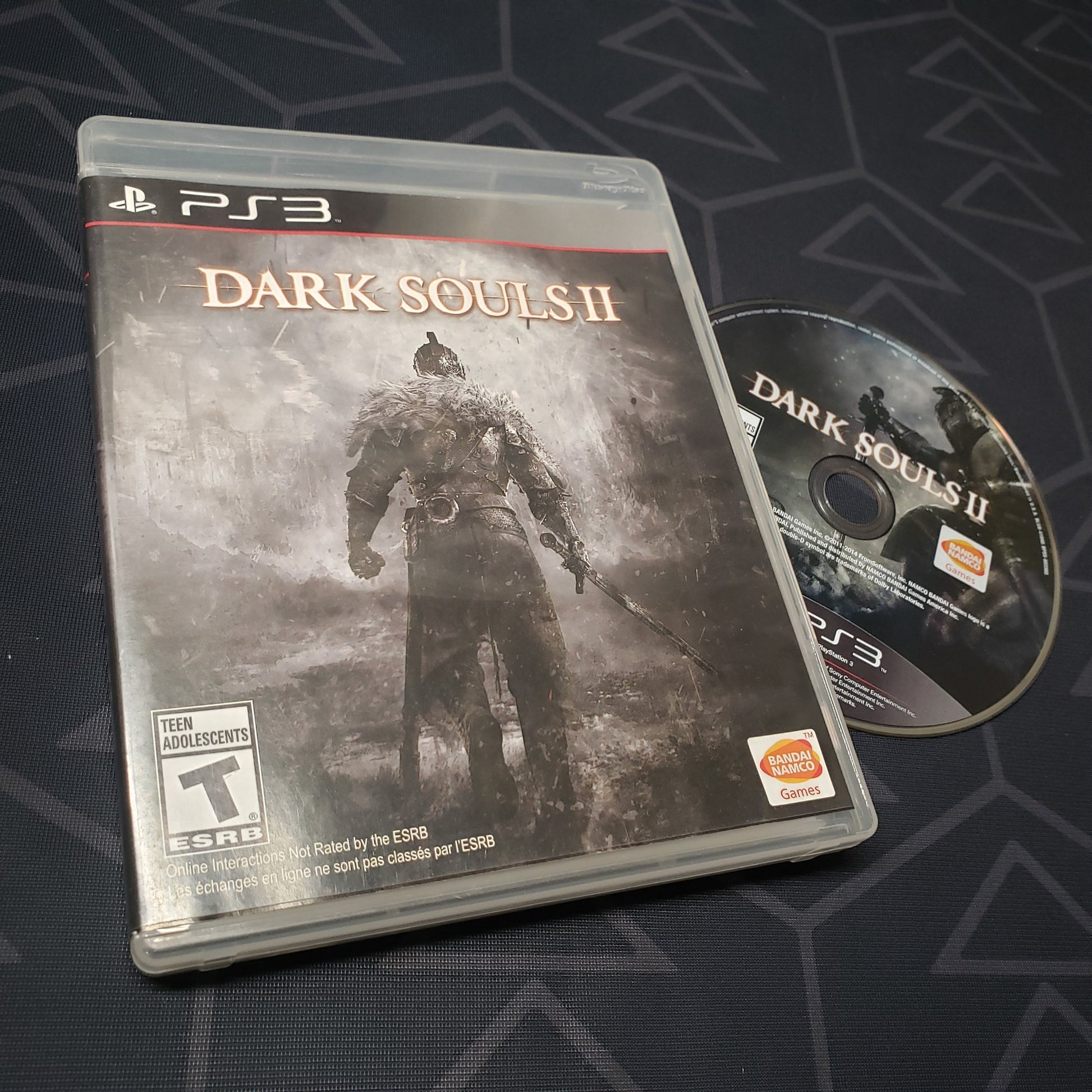 Image shows the case and disc for the video game Dark Souls II for Playstation 3