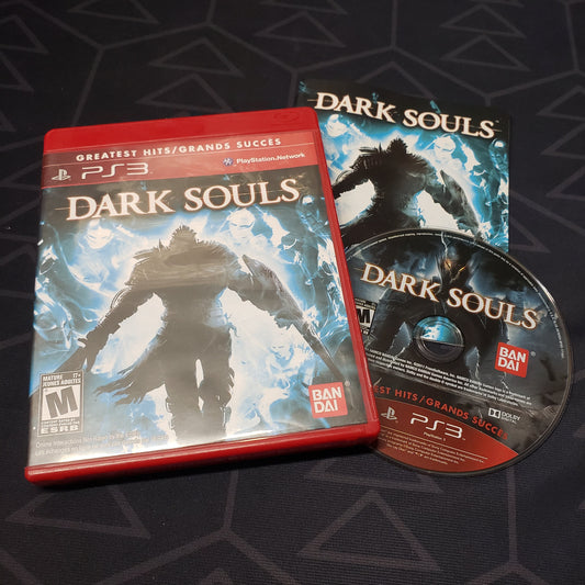 Image shows the case, manual and disc for the video game Dark Souls for Playstation 3