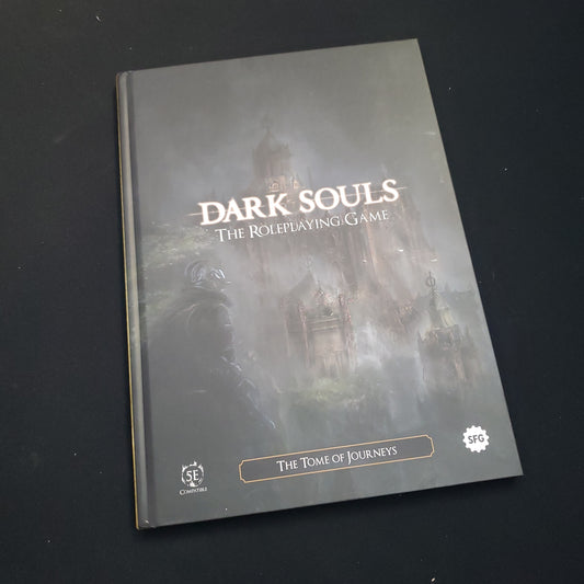 Image shows the front cover of the Tome of Journeys book for the Dark Souls roleplaying game