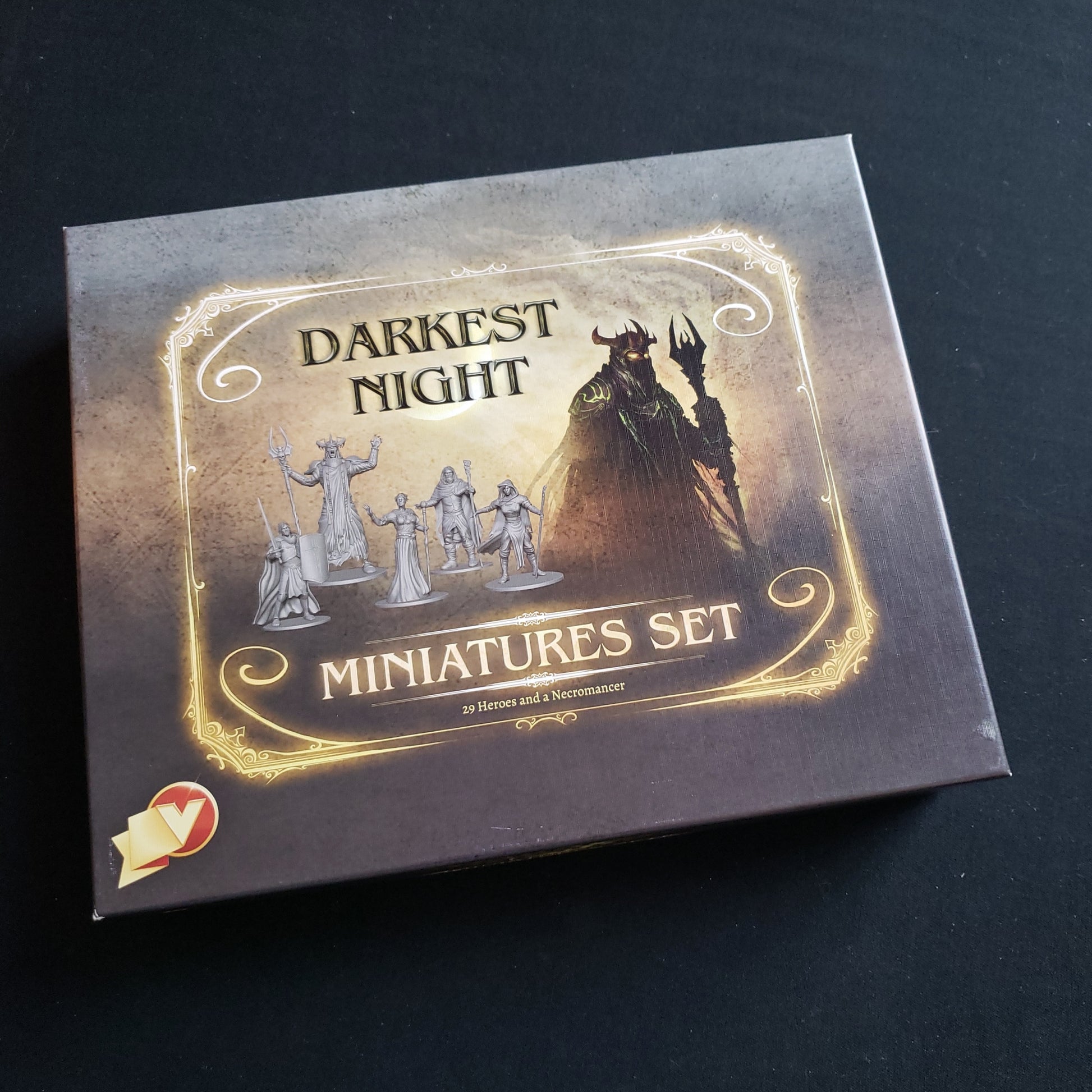 Image shows the front cover of the box of the Miniatures Set addon on for the board game Darkest Night: Second Edition