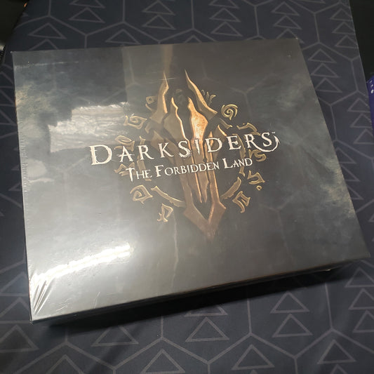 Image shows the front cover of the box for the Darksiders: The Forbidden Land board game