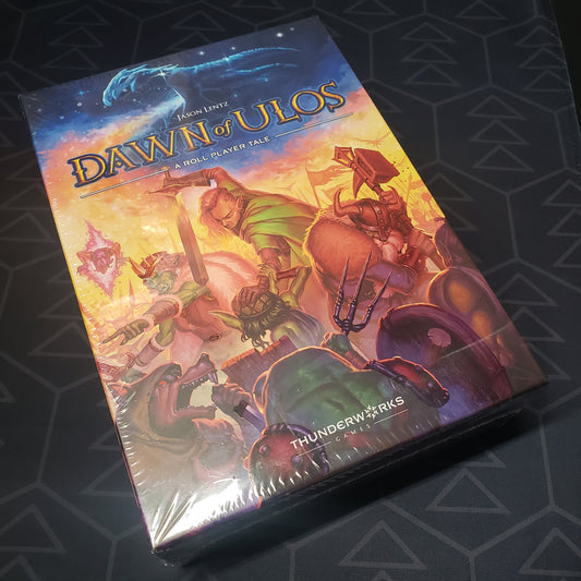 Image shows the front cover of the box of the Dawn of Ulos board game
