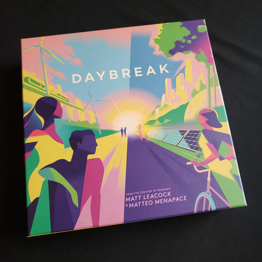 Image shows the front cover of the box of the Daybreak board game