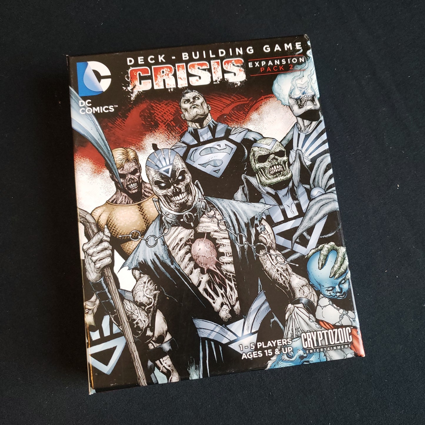 Image shows the front of the box for the Crisis Pack #2 Expansion for the DC Comics Deckbuilding card game