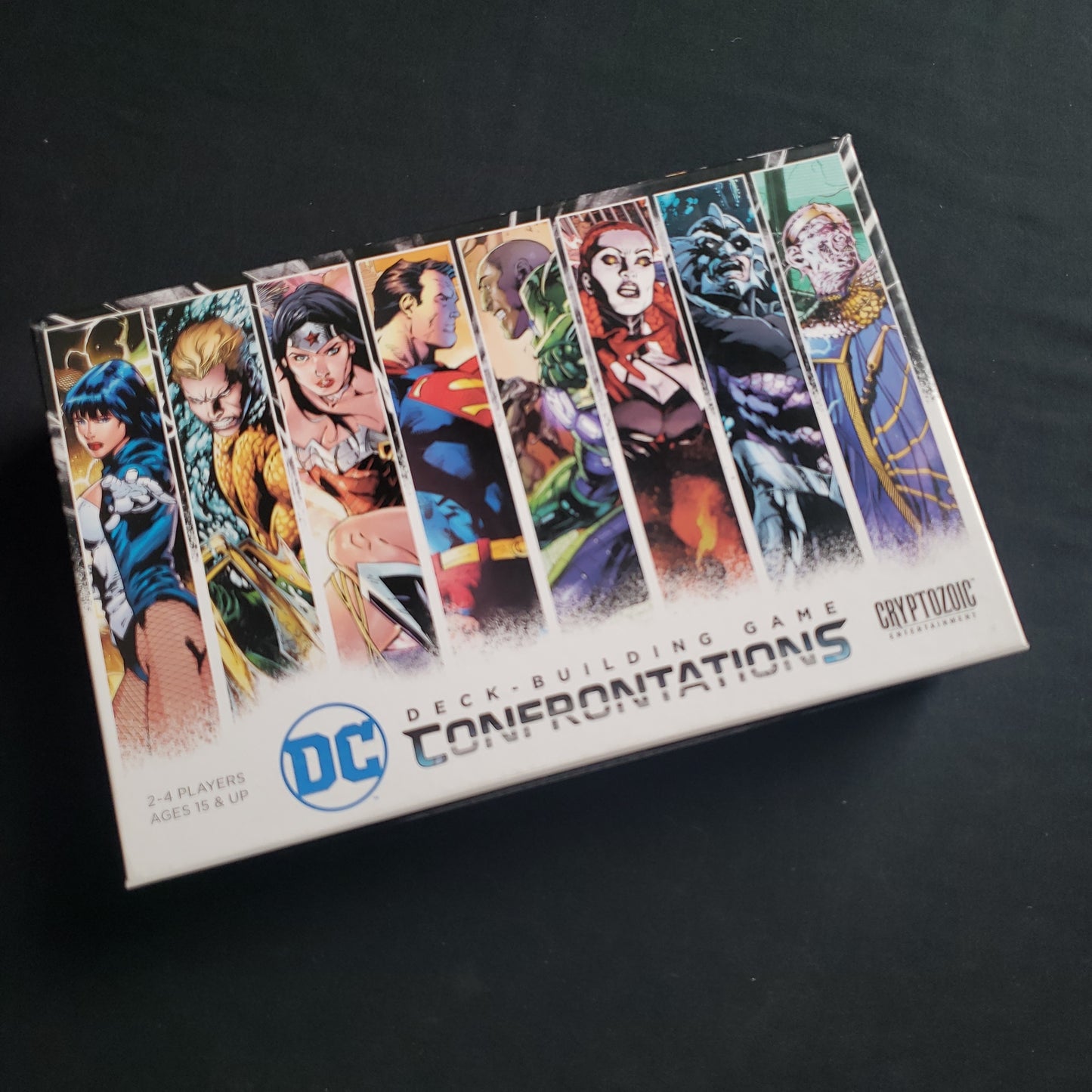 Image shows the front cover of the box of the DC Deckbuilding Game: Confrontations card game