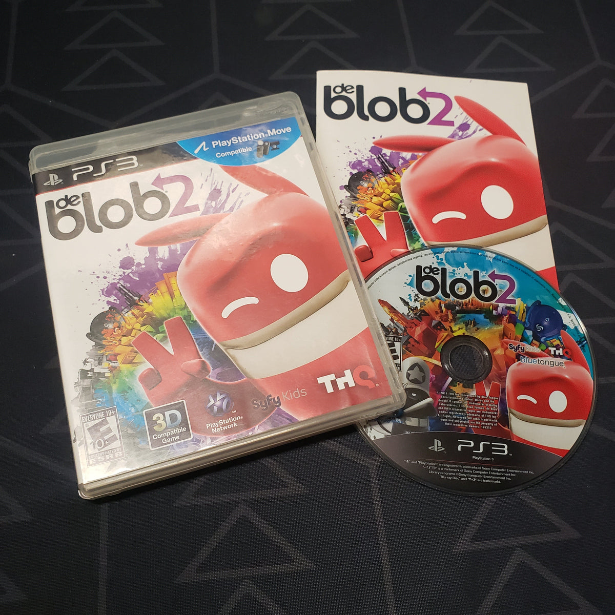Image shows the case, manual and disc for the video game De Blob 2 for Playstation 3