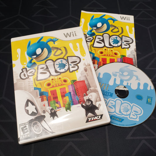 Image shows the case, manual & disc for the video game De Blob for Nintendo Wii