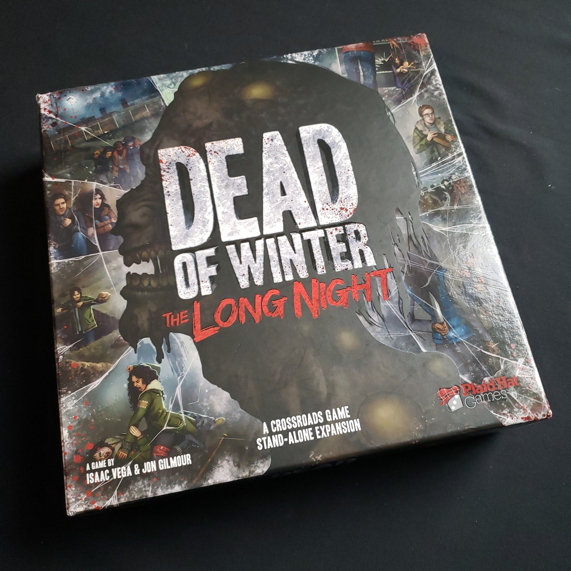 Image shows the front cover of the box of the Dead of Winter: The Long Night board game
