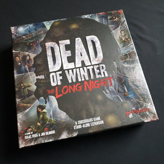 Image shows the front cover of the box of the Dead of Winter: The Long Night board game