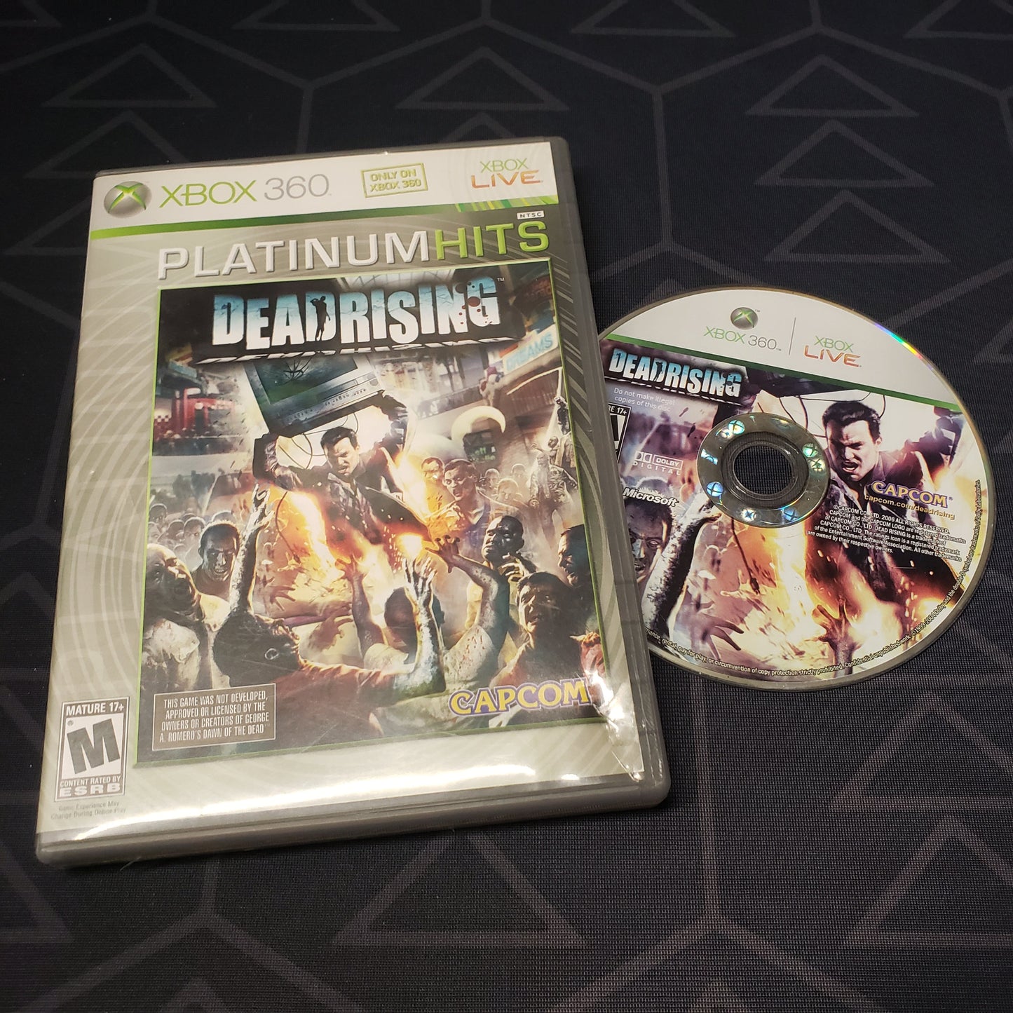Image shows the case & disc for the video game Dead Rising for Xbox 360