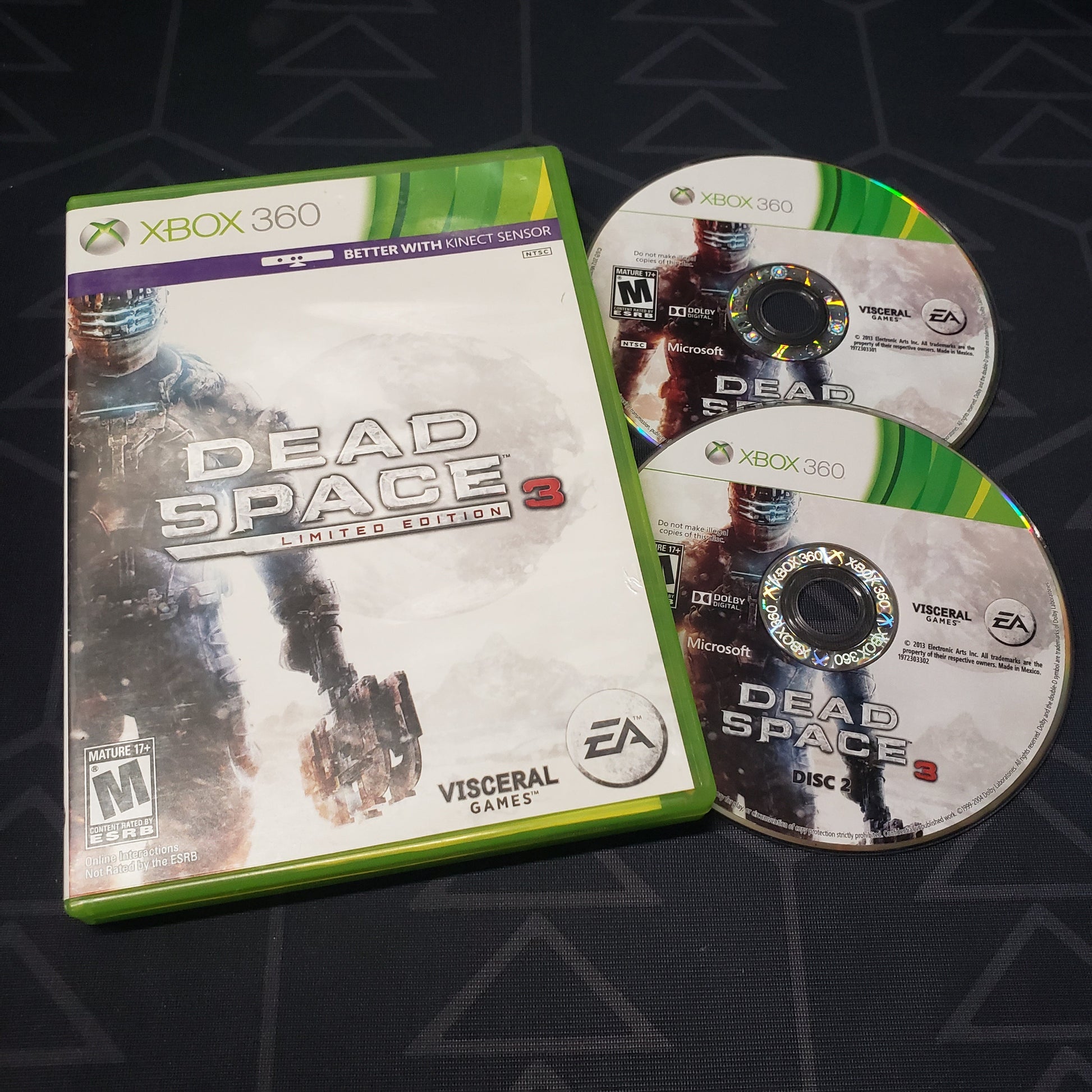 Image shows the case and two discs for the video game Dead Space 3 for Xbox 360