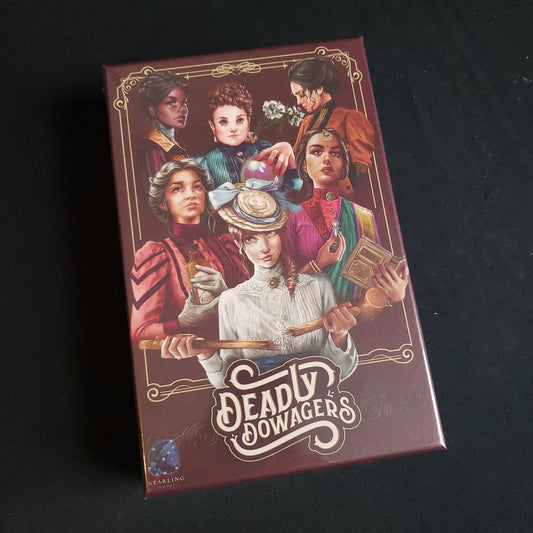 Image shows the front cover of the box of the Deadly Dowagers card game