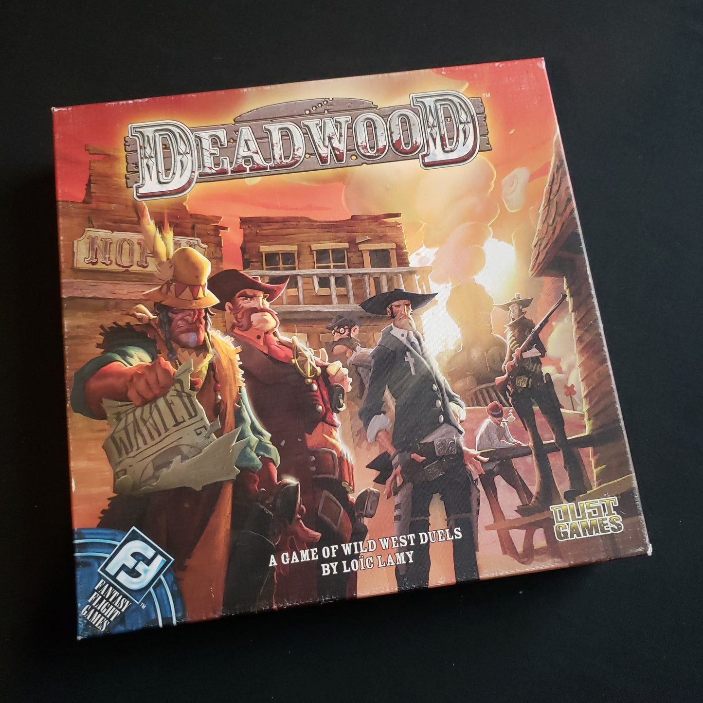 Image shows the front cover of the box of the Deadwood board game