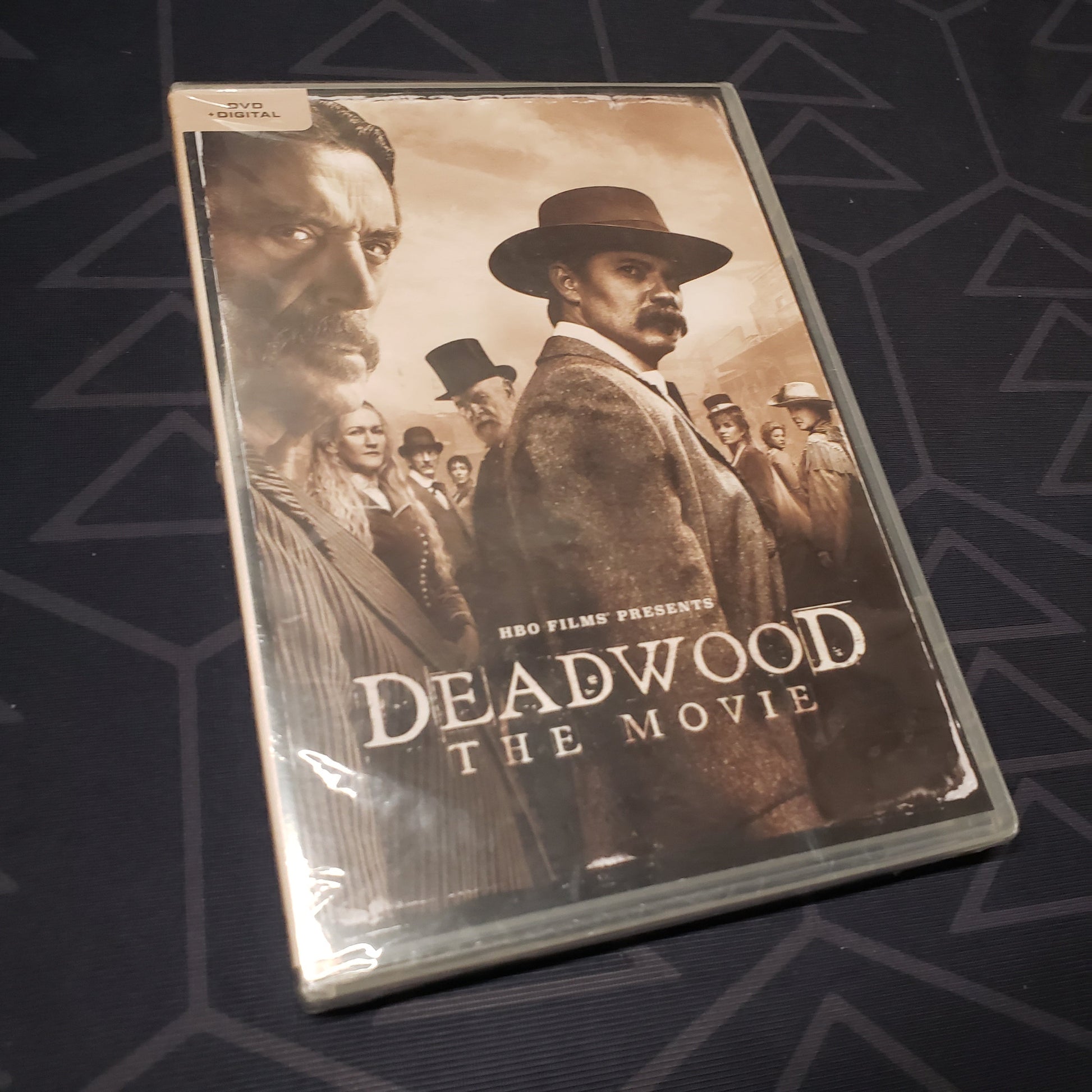Image shows the front of the case for the movie Deadwood: The Movie on DVD