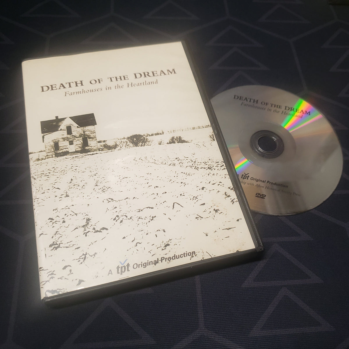 Image shows the case & disc for the documentary Death of the Dream: Farmhouses in the Heartland on DVD