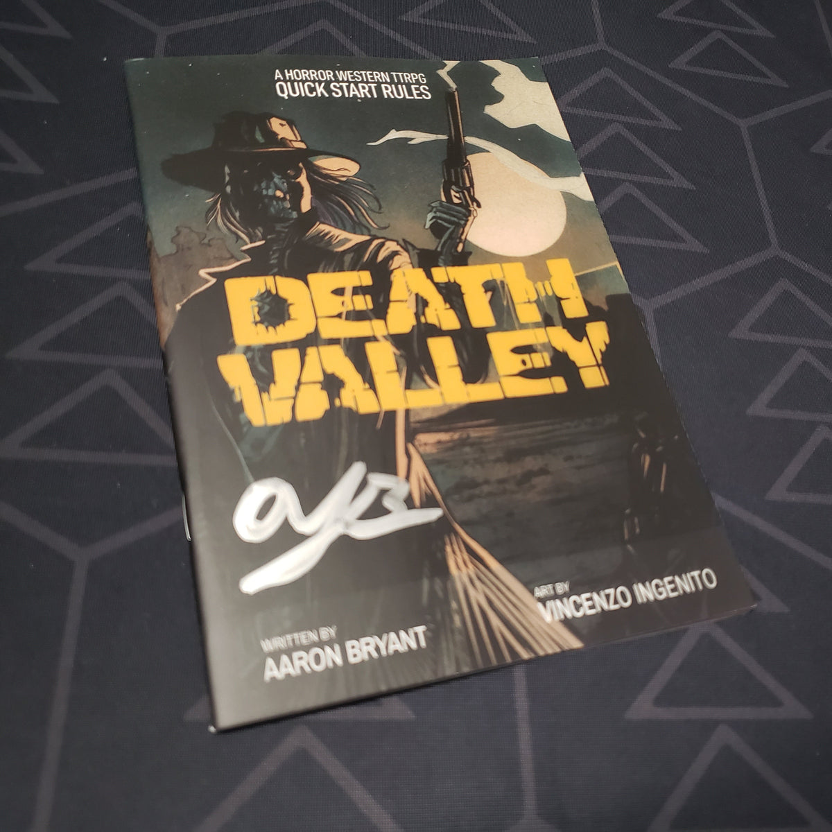 Image shows the front cover of the Death Valley: Quick Start Rules roleplaying game book