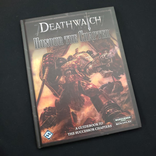 Image shows the front cover of the Honour the Chapter book for the Deathwatch roleplaying game