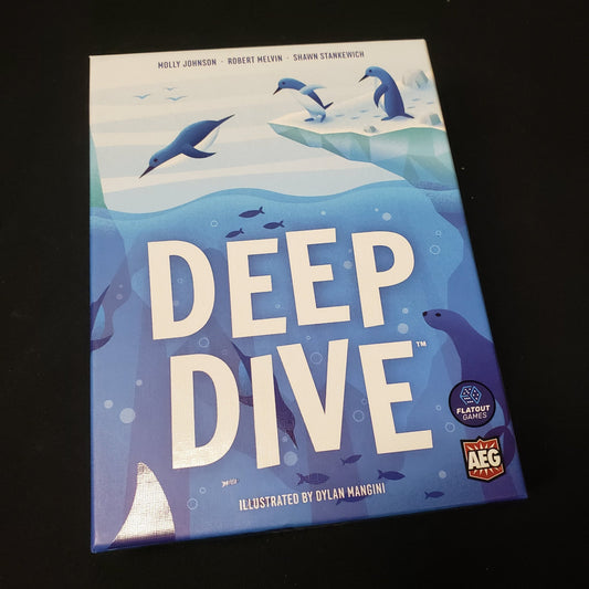 Image shows the front cover of the box of the Deep Dive board game