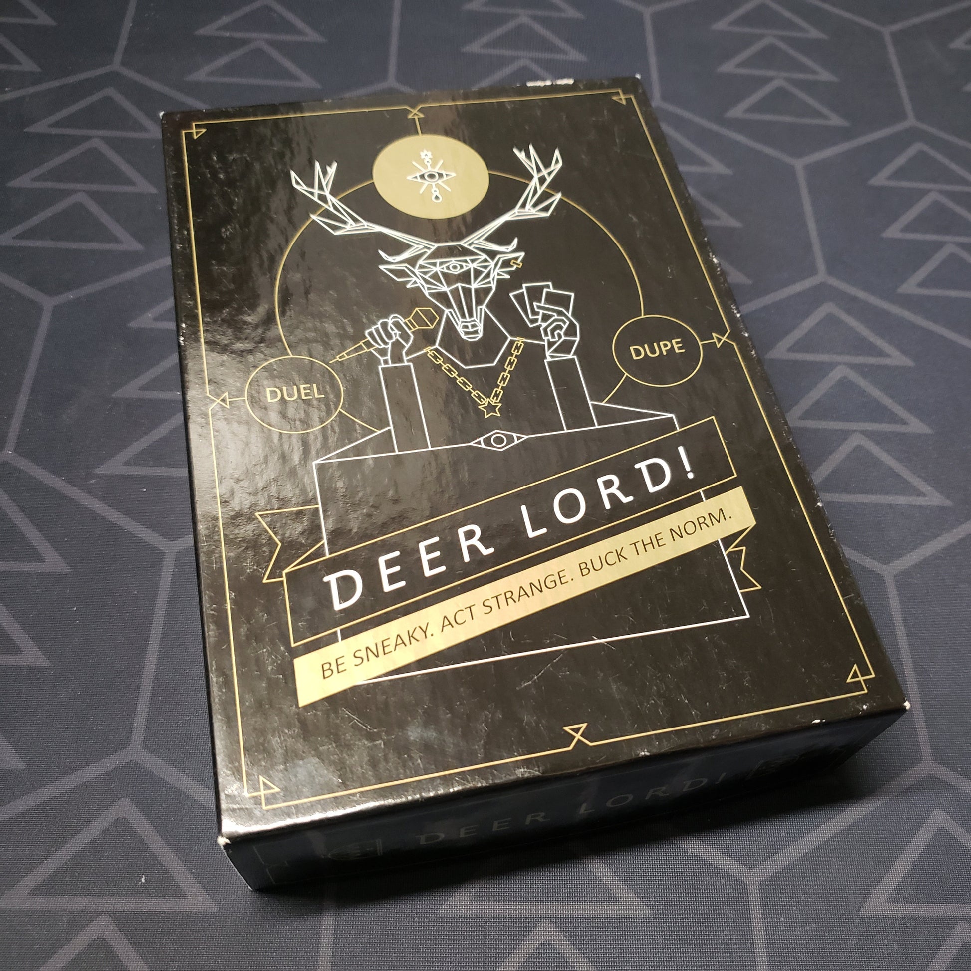 Image shows the front cover of the box for the DEER LORD! card game