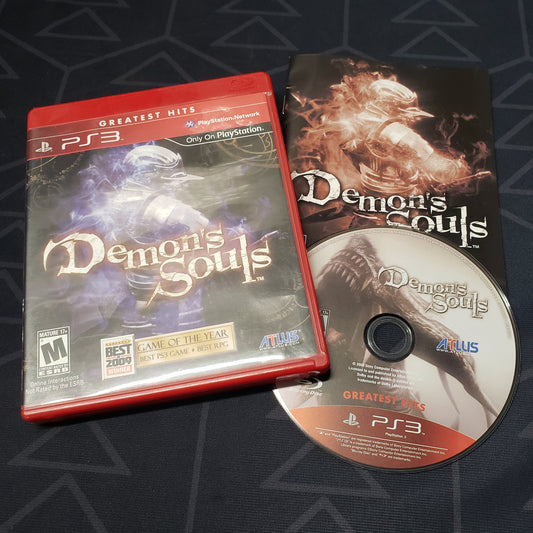 Image shows the case, manual and disc for the video game Demon's Souls for Playstation 3