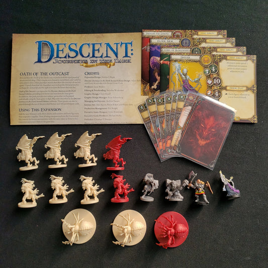 Image shows the components & instructions for the Oath of the Outcast expansion for the board game Descent: Journeys in the Dark Second Edition
