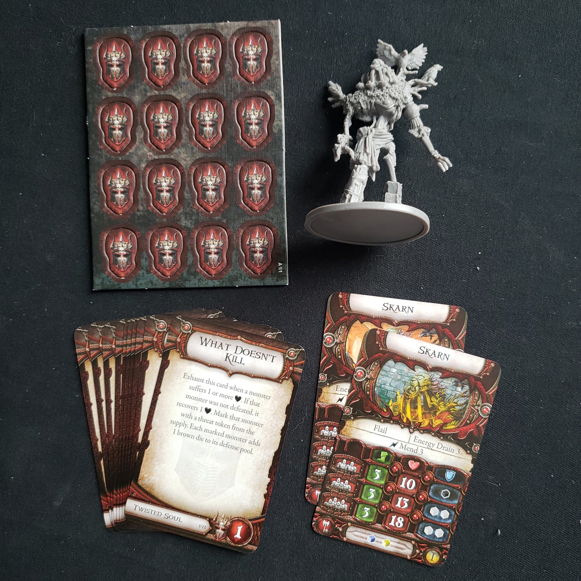 Image shows the components for the Skarn Lieutenant Pack expansion for the board game Descent: Journeys in the Dark Second Edition